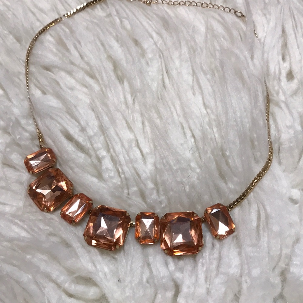 Large rose gold colored gems necklace